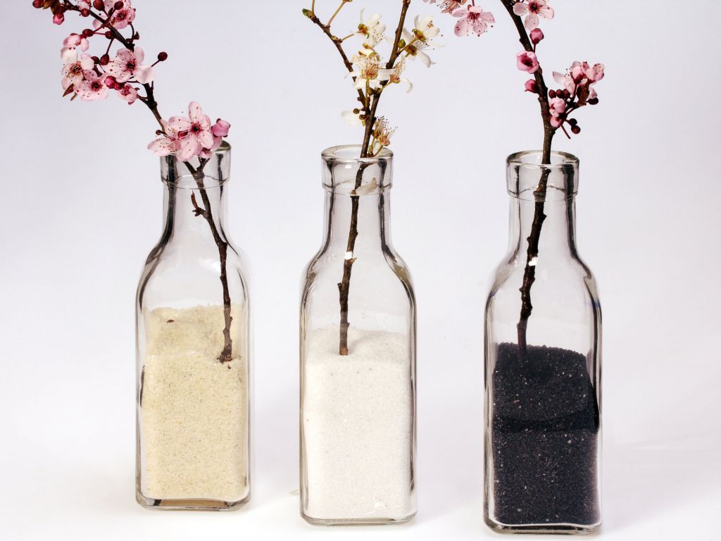 Three bottles of coloured sand ready to be poured at the Sand Ceremony, Fuerteventura Wedding ceremony options
